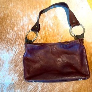 Gently pre-owned beautiful leather bag. No stains or ink marks